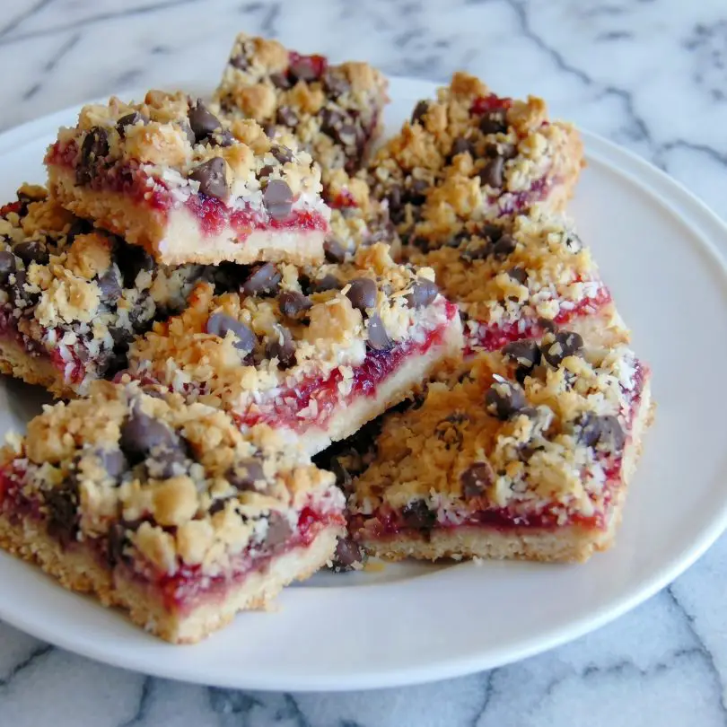 Raspberry Coconut Chocolate Chip Bars (Buttery, Jammy & Irresistible)
